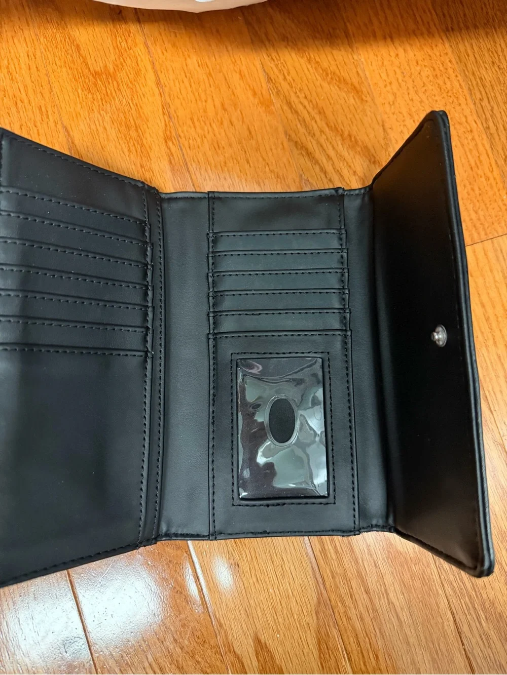 GUESS Gray Monogram and Black Trim Fold Wallet